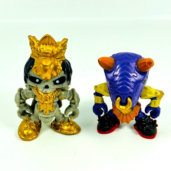Treasure X Figures Lot Of 2 Skeleton King And Purple Dino Moose Toys - Picture 1 of 6